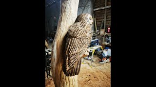 Feather detailing in a bit more detail on a double Tawny owl chainsaw sculpture.