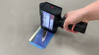 Printing the production date and batch number on the label of the color recognition handheld inkjet