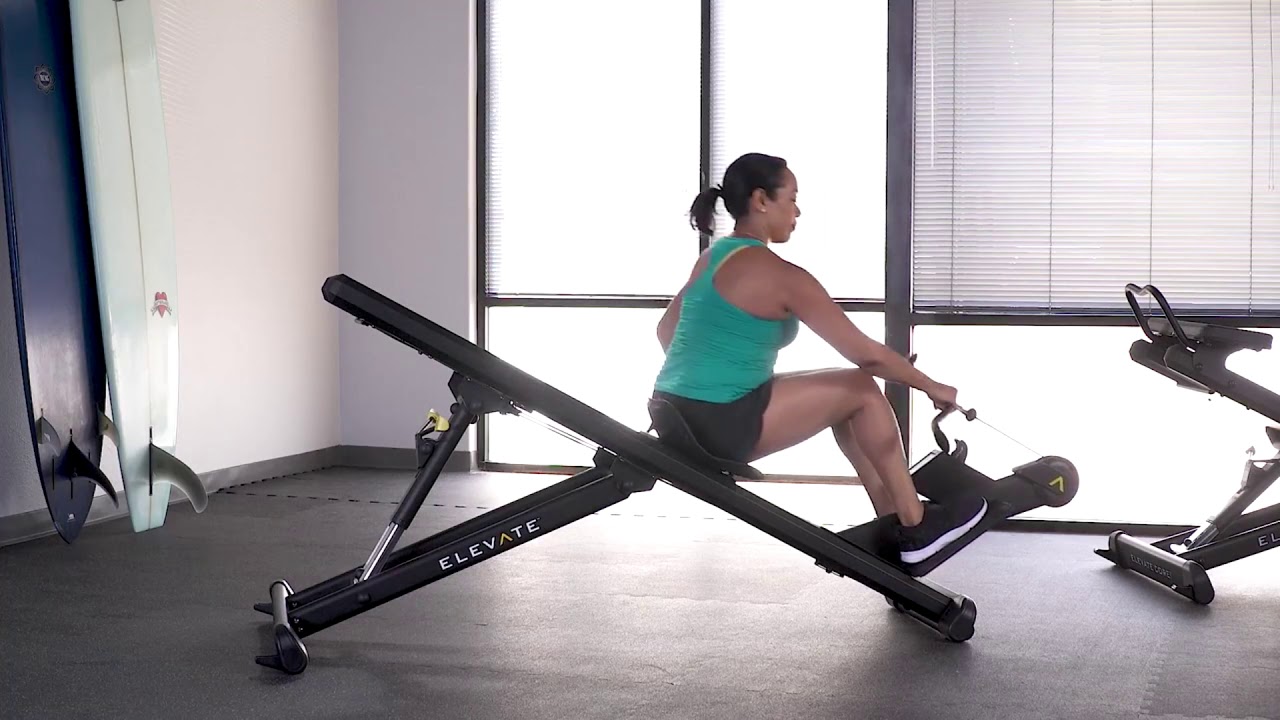 Тяга одной рукой с поворотом на Total Gym Row Trainer гребной тренажер