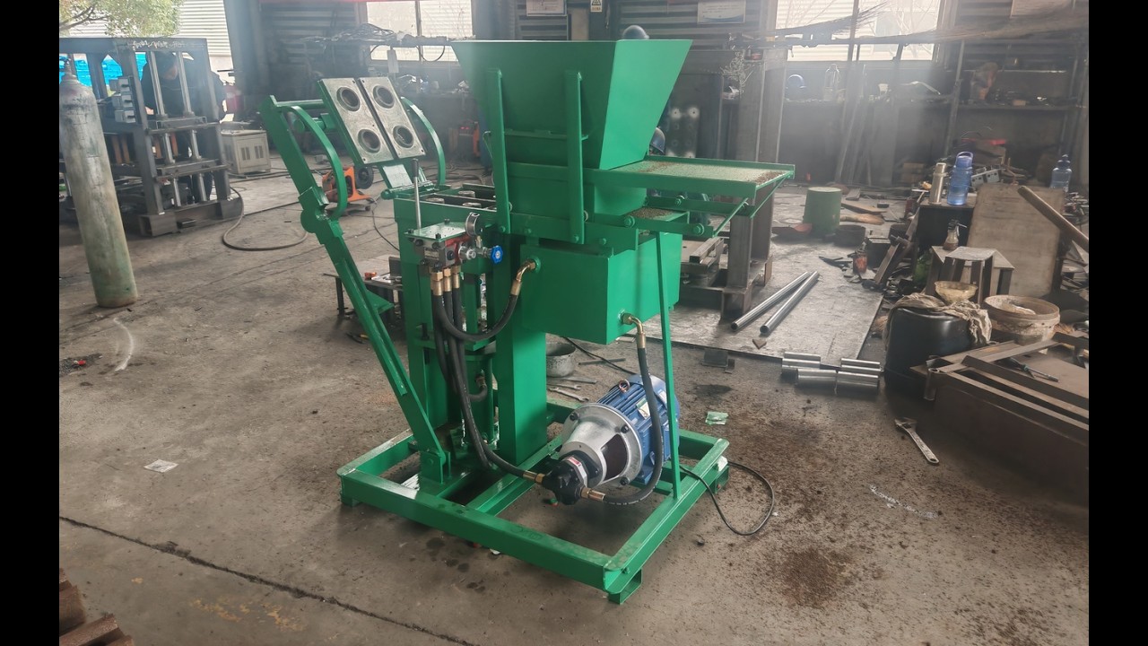 small interlocking soil earth brick making machine - YouTube