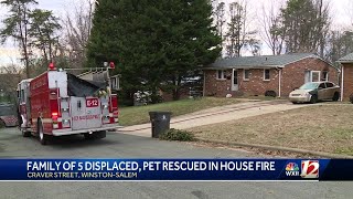 Dog rescued from house fire, family of 5 displaced
