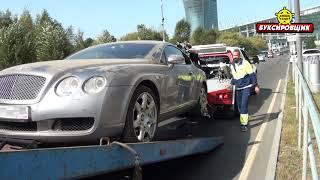 Эвакуация методом частичной погрузки Bentley Continental из многоярусного паркинга