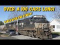 Streetrunning with a train over a 100 cars long takes over the street