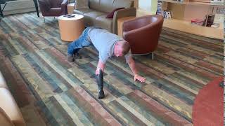Sgt. Garrett Anderson doing pushups with the PSYONIC Ability Hand