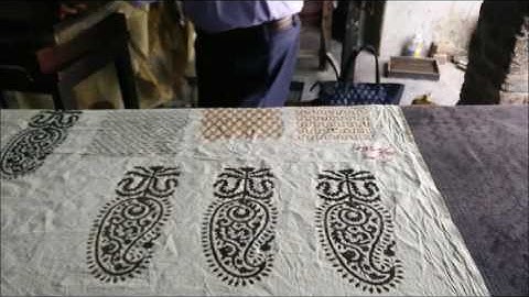 Artisan showing multi layer block printing