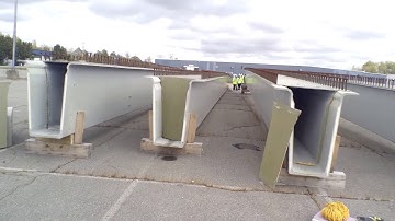 UMass Lowell researchers installing sensing textiles onto composite bridge girders in Brewer, Maine