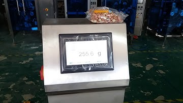 Full automatic vertical packing machine with vertical metal detector and horizontal check weigher.