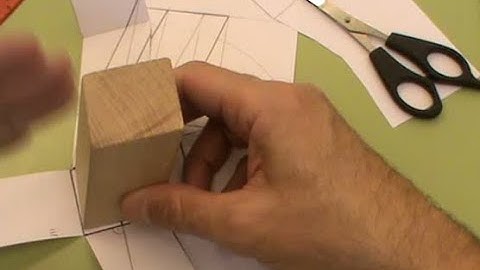 Desarrollo de un prisma oblicuo de sección cuadrada.