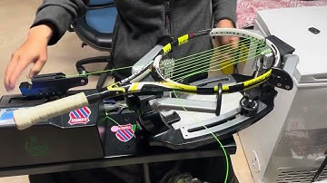 Tennis racquet stringing.  Starting mains using another modified Yusuki method for more even tension