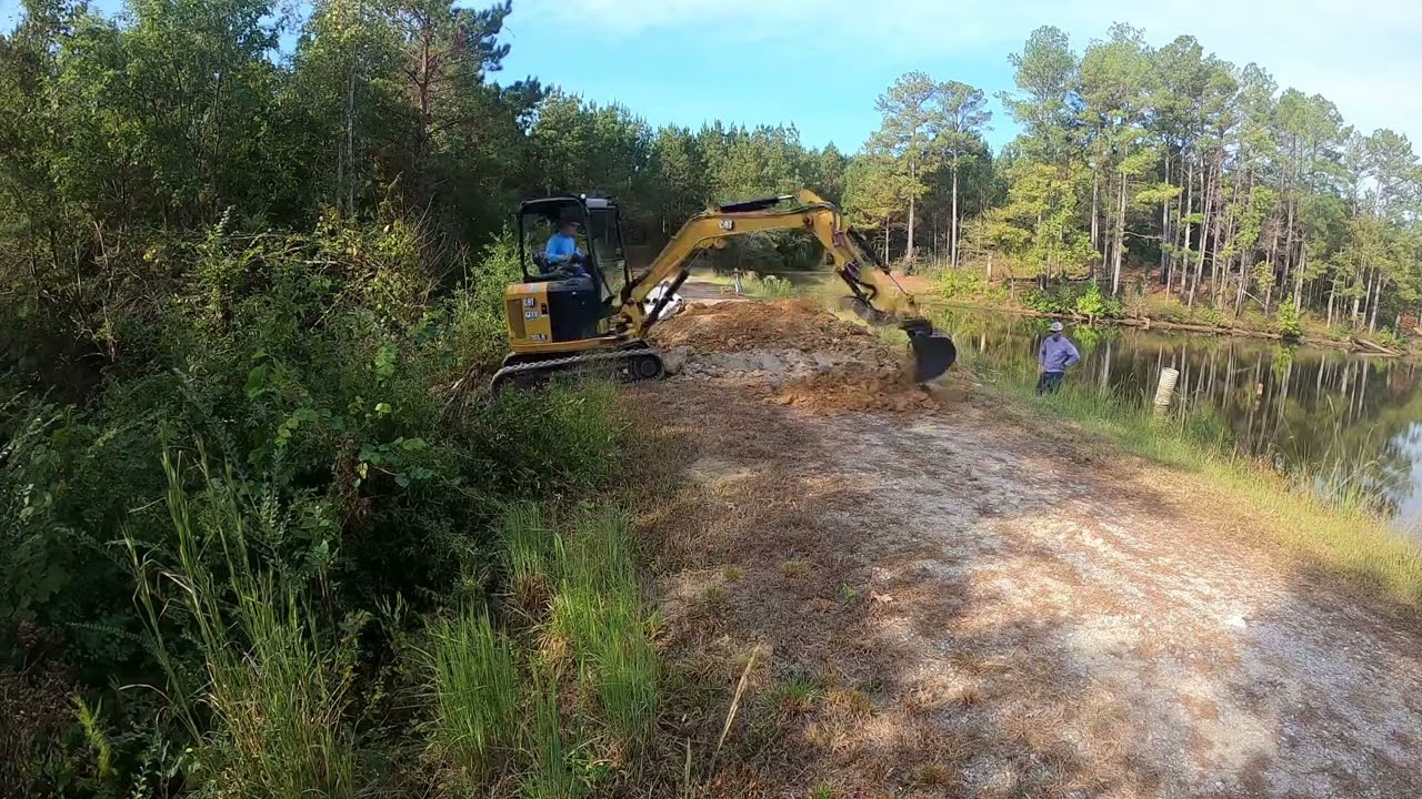 Siphon system installation in an existing lake.