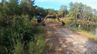 Siphon system installation in an existing lake.