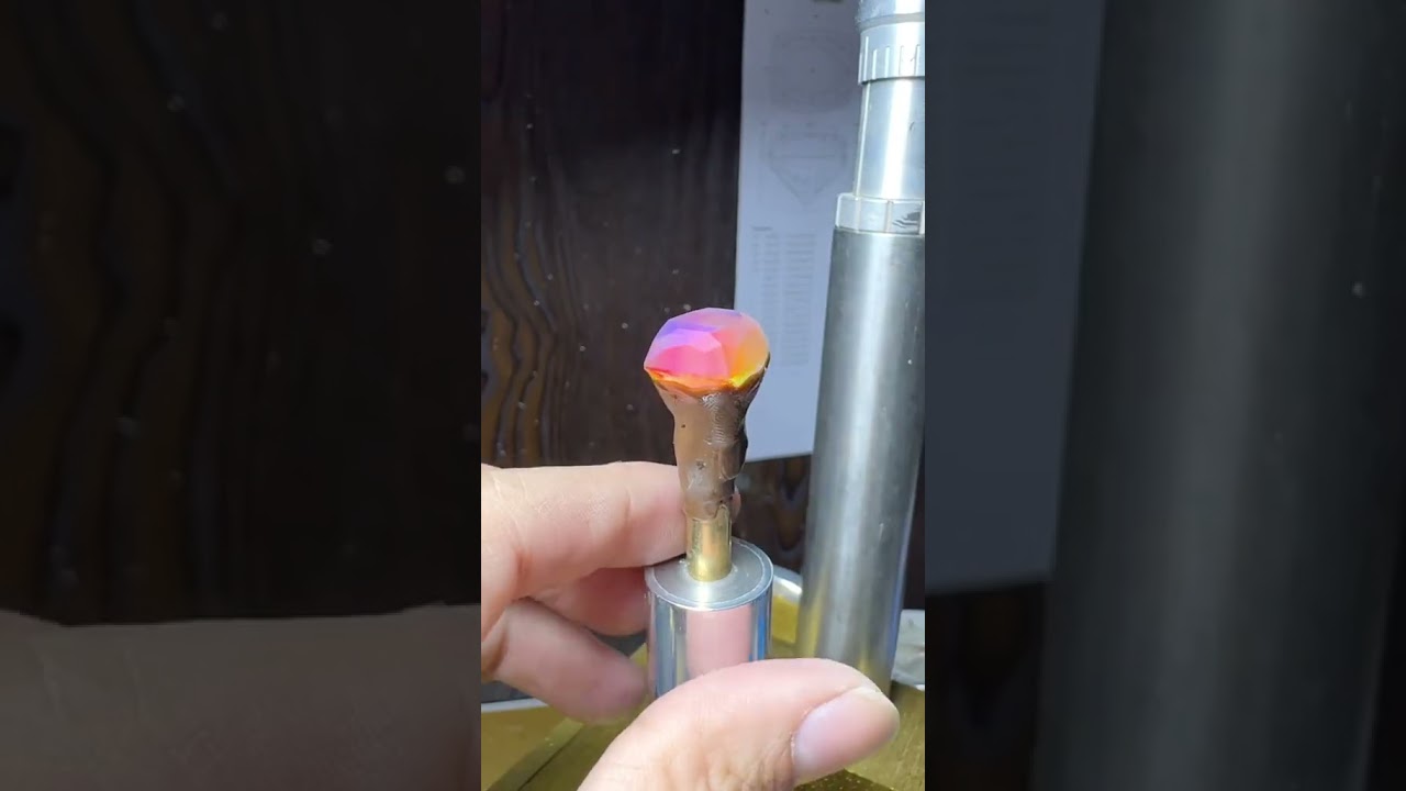 Gem polishing process involves grinding, smoothing, and finishing