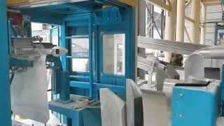 Fully automatic valve bag filler with bag placer air packer