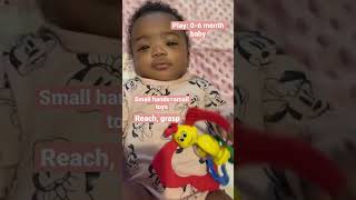 Play baby 0-6 months occupational therapy reach grasp small hands=small toys child development