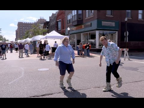 Happy Dave and his cash-covered boots bounce around Wausau’s Artrageous weekend
