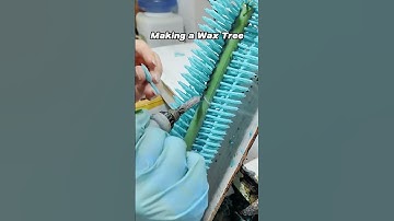 Position the wax models on the wax tree in preparation for casting. #xhsilver