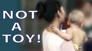 China Cop Throws Baby Over Drunken Bet