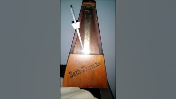 A mechanical metronome in motion