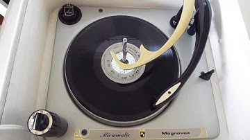 Magnavox automatic portable record player playing a 16 RPM record.