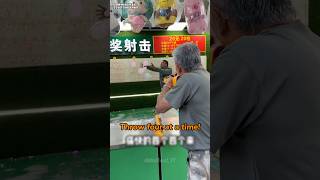 Retired Soldier Grandpa’s Final Round at the Balloon Shooting Game 😂