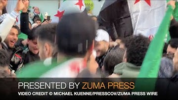 ZUMA Video: Germany: Syrian crowds rally in Berlin on first anniversary of Assad
