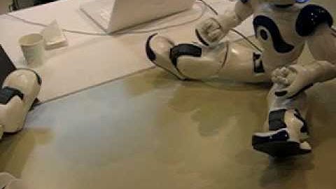 Aldebaran Nao Robots making deals with each other