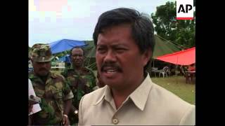 Damage following earthquake, injured in tents