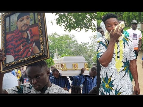 Burial Of Mad Melon of 'Danfo Driver' Meet His Brother As They Cary His Casket To Cemetery