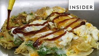 Japanese Pancake Stuffed With Egg And Noodles
