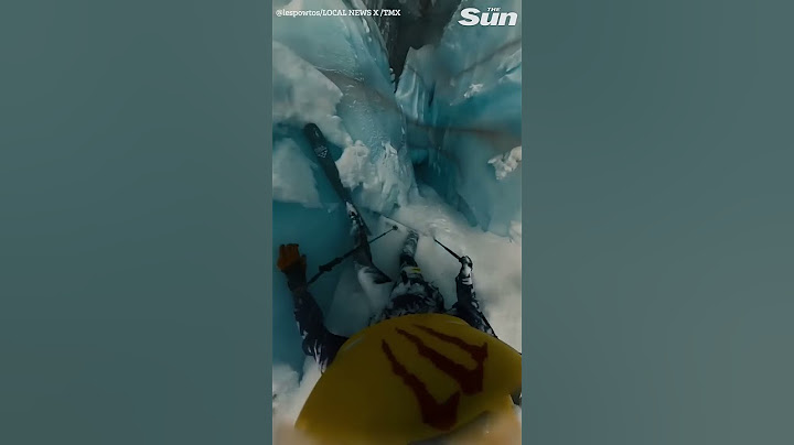 Terrifying moment skier falls into massive crevasse caught on helmet cam