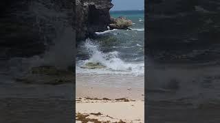 sea cliffs, Barbados relaxing sounds of waves playing on rocks and sandy beach.