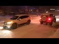 Cars spin out and become stuck after snow storm near Lake Arrowhead, California.