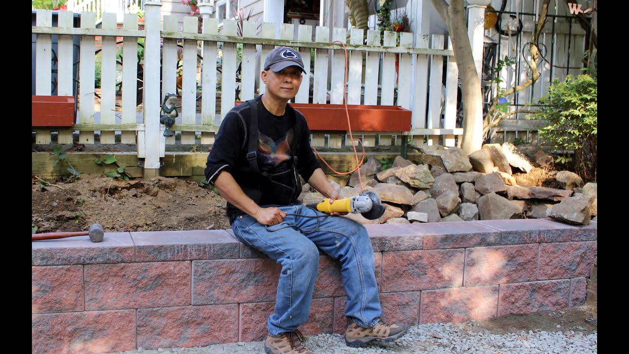 How to build a retaining wall DIY - YouTube