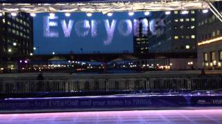 Canary Wharf ( London ) fountain with text