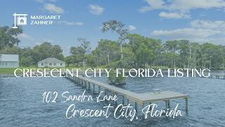 102 Sandra Lane Crescent City | Crescent Lake Waterfront Home with New Dock | Margaret Zahner