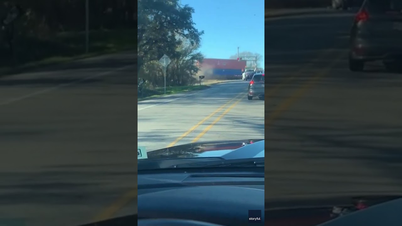 Train derails after striking 18-wheeler stuck on tracks in Texas #Shorts