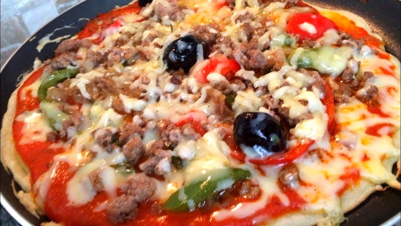 بيتزا 🍕المقلاة السريعة بدون فرن بدون دلك بدون إختمار كتوجد بسرعة البرق 😋🍗