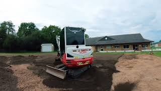 Takeuchi TB230 With A Engcon Tilt Rotator.