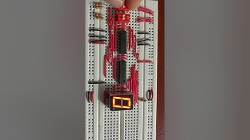 Protoboard sumador de dos números de dos bits.