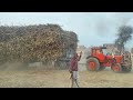 Tractors pulling heavy loaded trailer