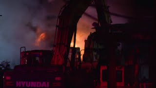 Massachusetts junk yard fire takes hours to control