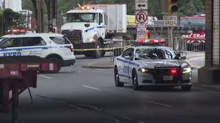 Woman dies after being struck by dump truck, Jeep in Coney Island