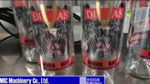 labeling machine Video for Big round bottle front back sides