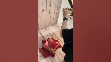 Newborn photo shoot with flowers and pink theme - behind the scenes