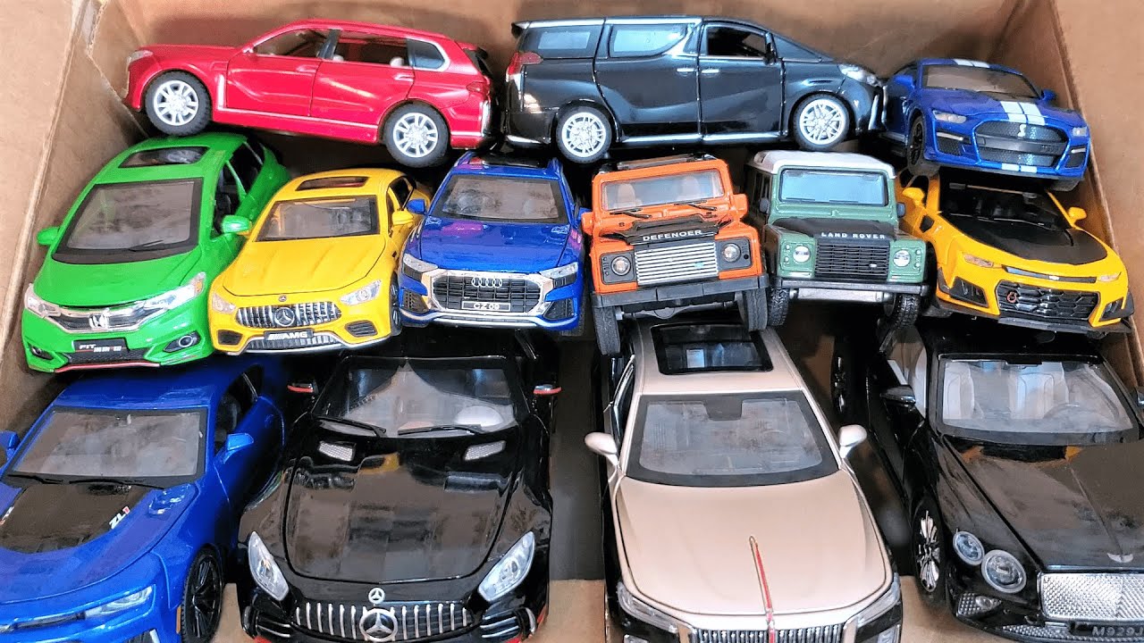 A Cardboard Box Full Of Diecast Model Cars Collection of Diecast