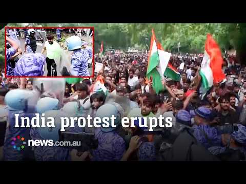 Delhi police fire tear gas as thousands rally against Modi government