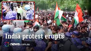 Delhi police fire tear gas as thousands rally against Modi government
