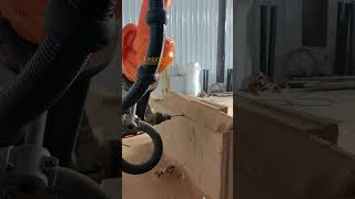 Powerful robotic arm carving a wooden fish with ATC spindle