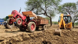 Jcb 3dx Backhoe Machine Loading Mud in Mahindra Yuvo tractor | Jcb and tractor