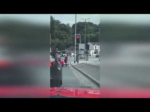 SHOCKING MOMENT DRIVER SUPLEXES CYCLIST INTO MOTOR DN VID00